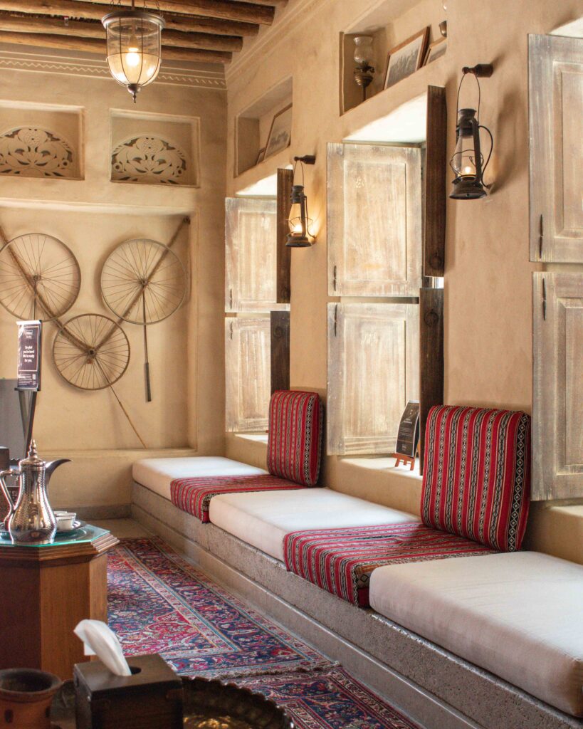 Cream and red patterned cushioned seating area in foyer of Al Seef Heritage Hotel, Dubai